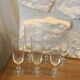 6 chiseled champagne flutes on vintage floral frieze pattern