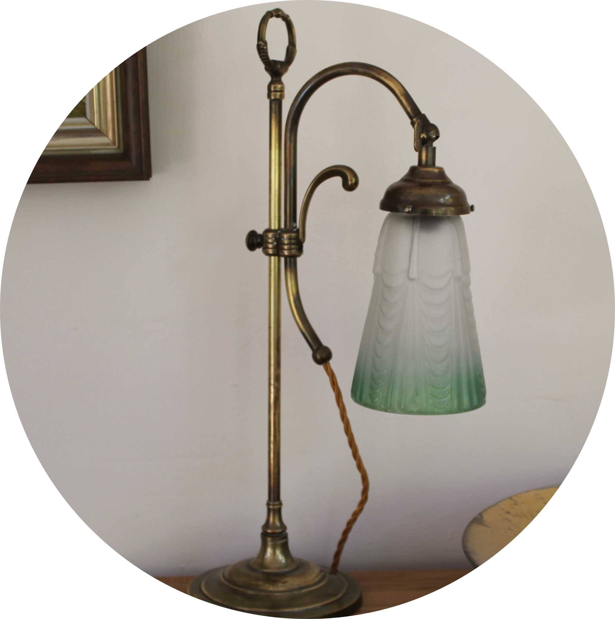 Art Nouveau style brass "rise and fall" table lamps after WAS Benson