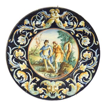 Round dish in majolica earthenware with Hermès polychrome decoration guiding an old man