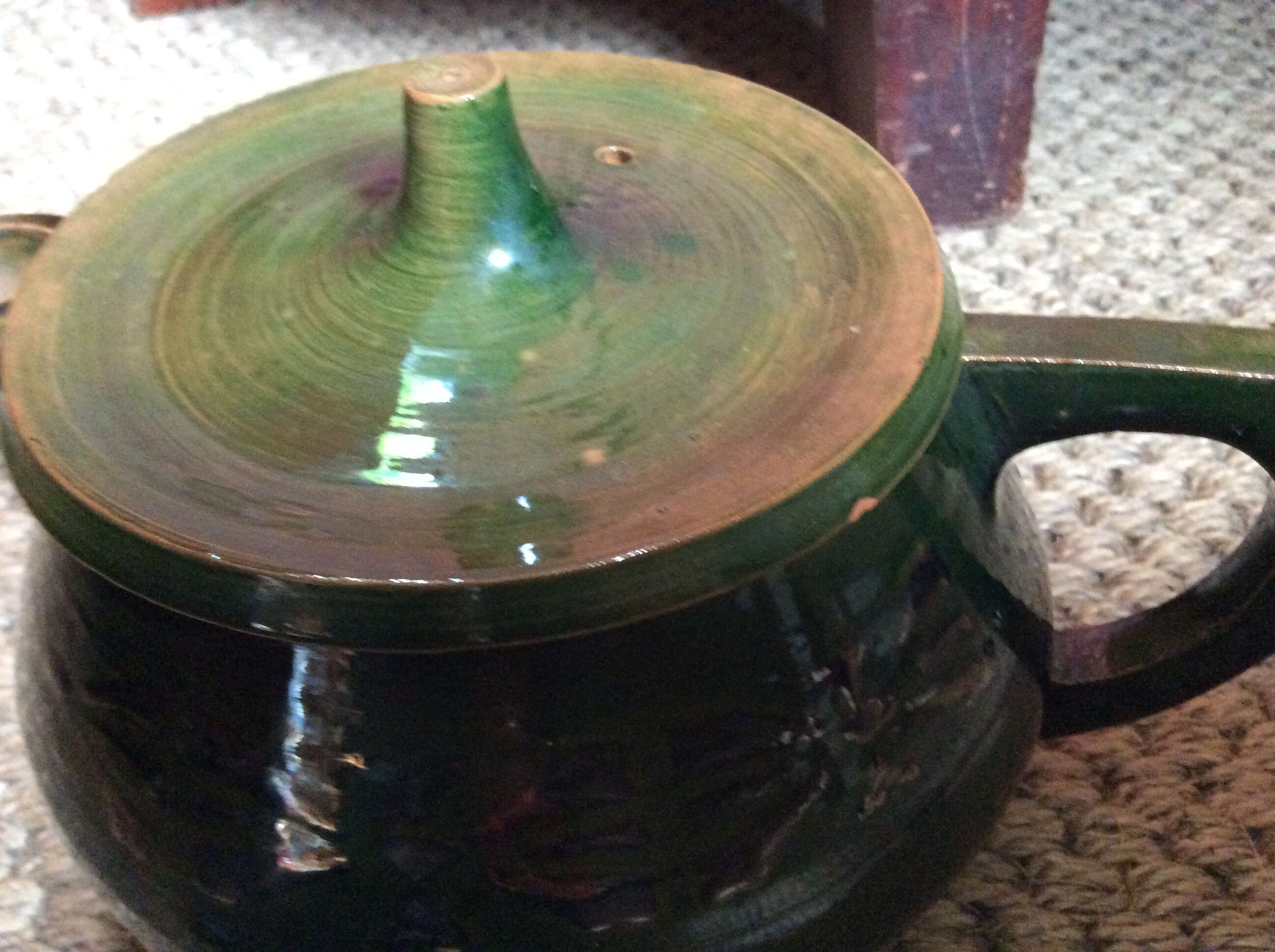 Glazed terracotta teapot