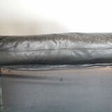Pair of designer leather armchairs 80s