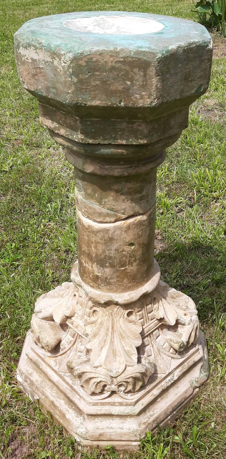 Holy water font on stone column (17th century)