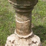 Holy water font on stone column (17th century)