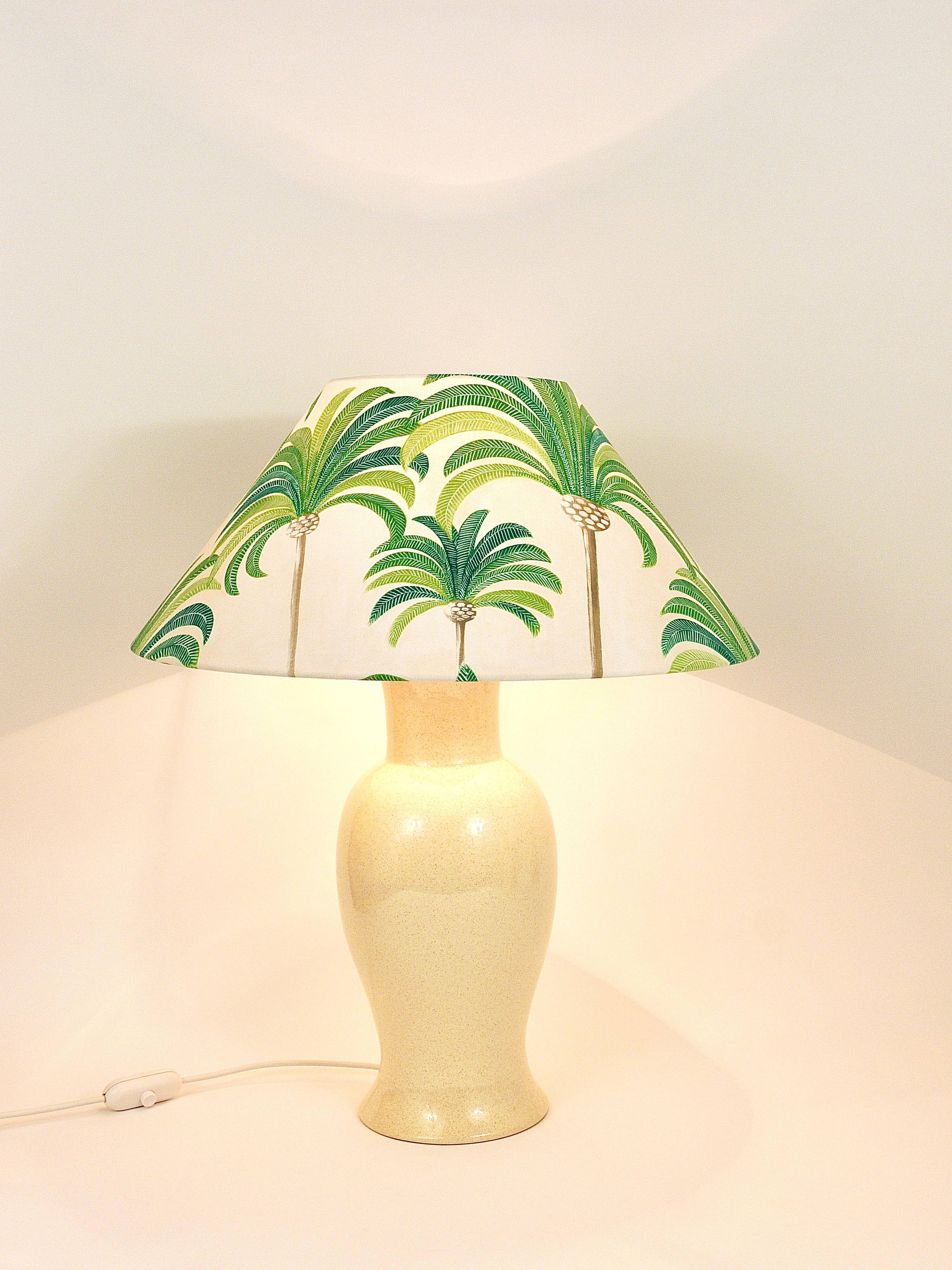 Pair of Tommaso Barbi Riviera palm tree table lamps from the 1970s with matching cushions.