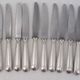 Alfénide Christofle Louvois Shell, 24 knives: 12 dinner knives + 12 cheese knives.