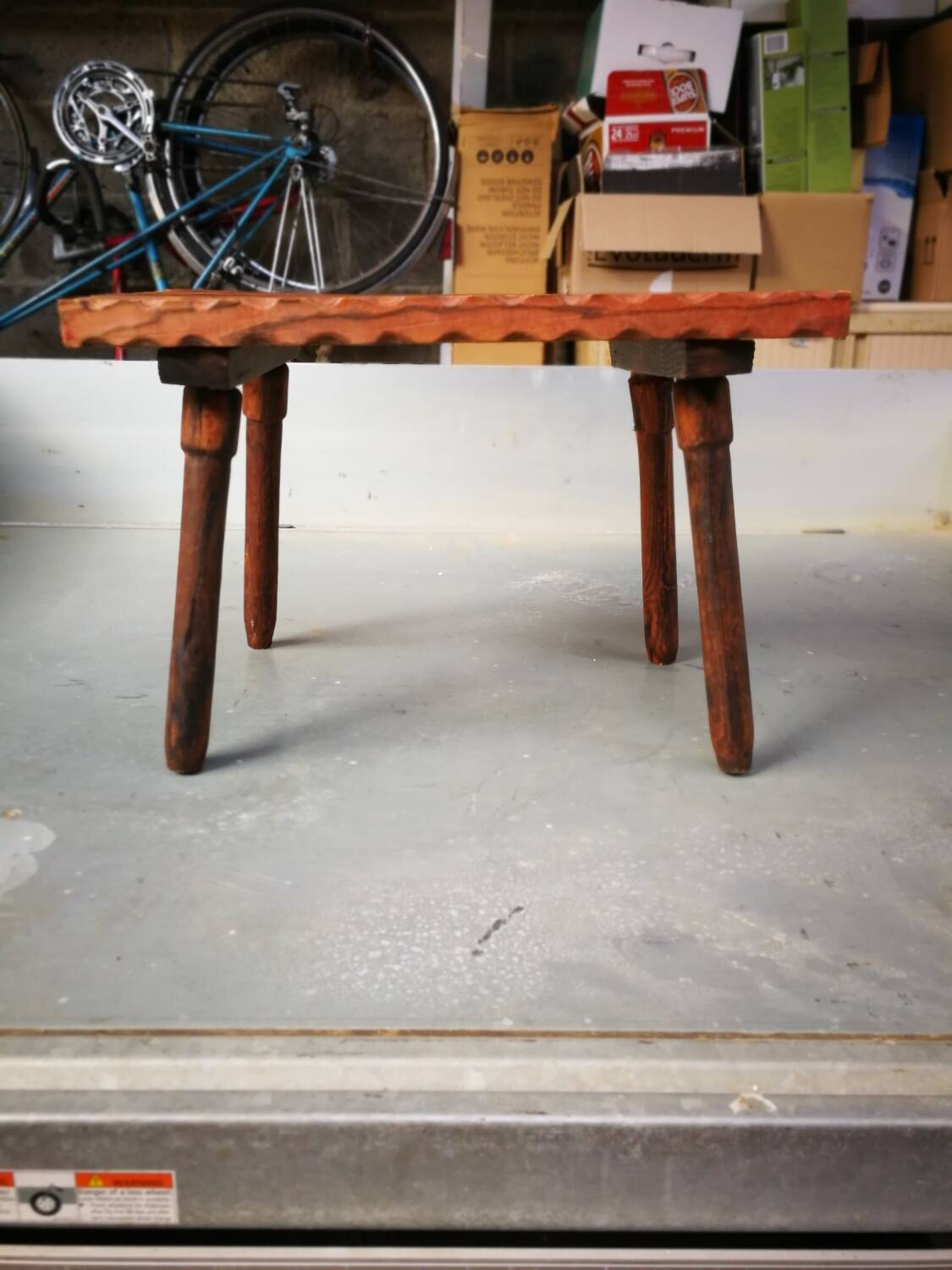 Raw hammered side table