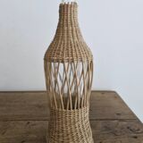 Glass and wicker bottle