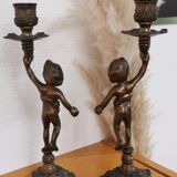 Pair of antique candlesticks in bronze and brass