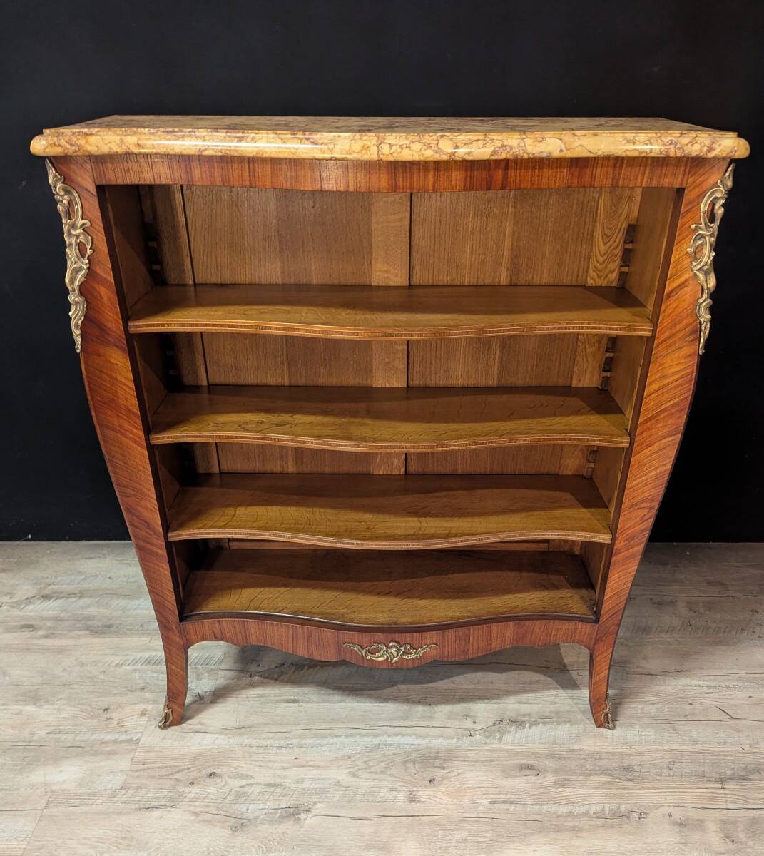 Bureau in the Louis XV style with rosewood marquetry and a marble top.
