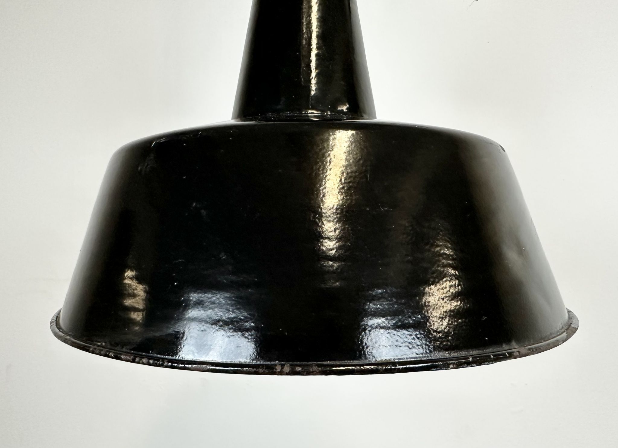 Industrial black enamel factory lamp with cast iron top, 1960s