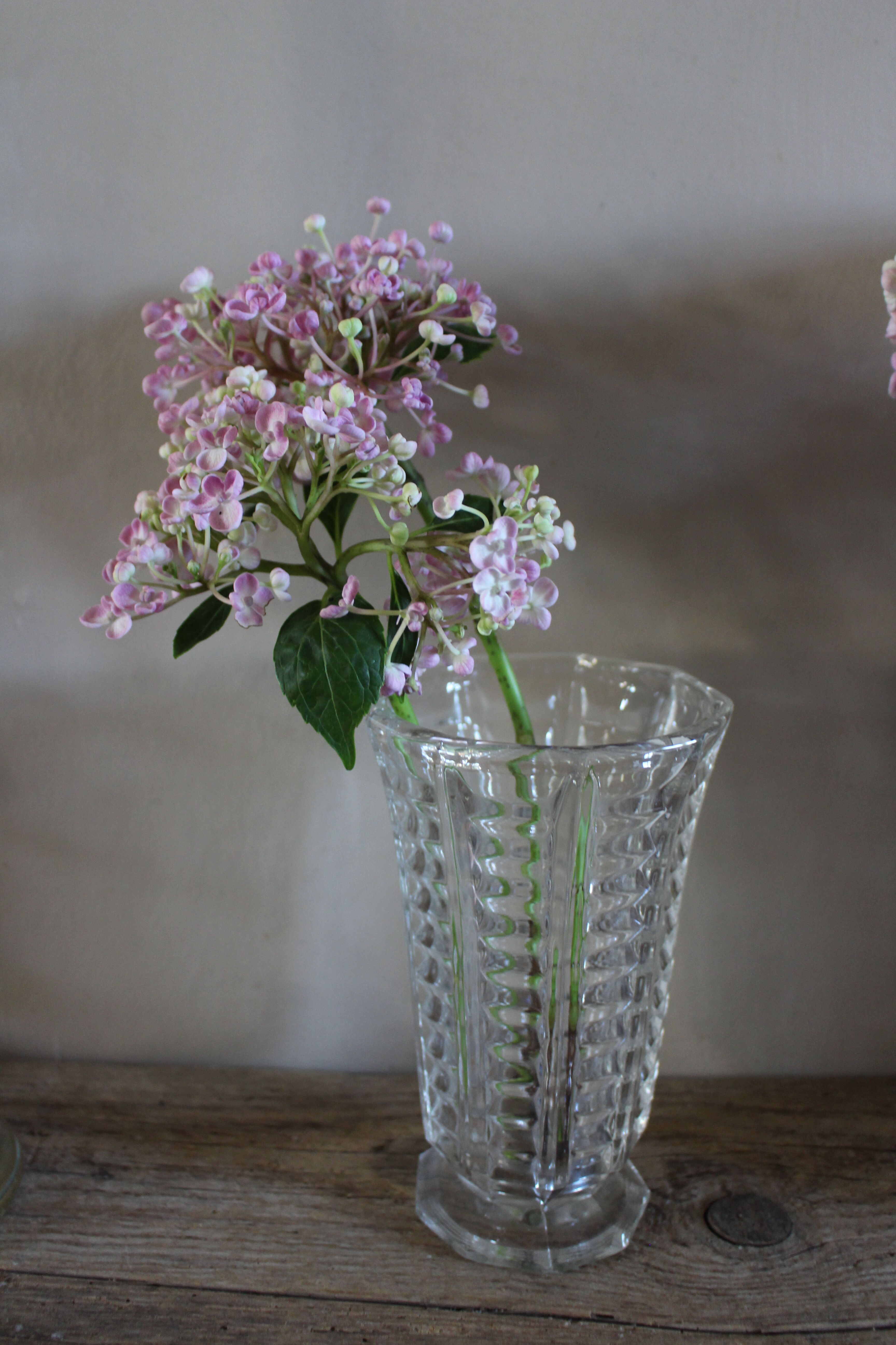 Vintage transparent cut glass pedestal vase