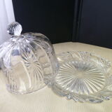 Old cheese bell on its molded pressed glass tray