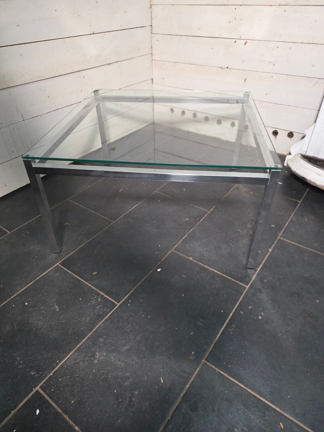 Chrome metal coffee table with a glass top from the 1970s.
