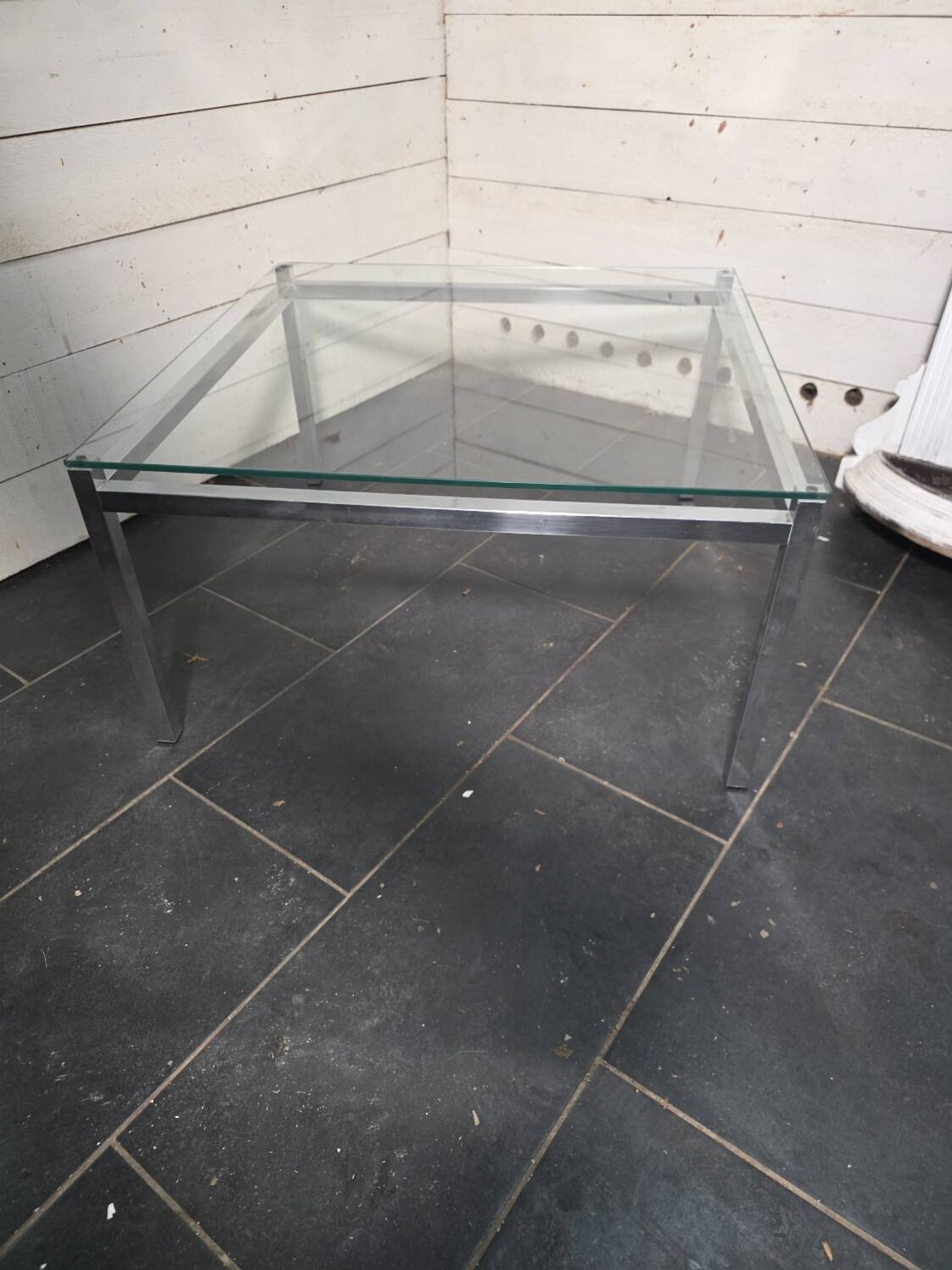 Chrome metal coffee table with a glass top from the 1970s.