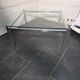 Chrome metal coffee table with a glass top from the 1970s.