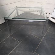 Chrome metal coffee table with a glass top from the 1970s.