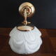 Brass wall lamp and white glass globe from the 1950s-1960s.