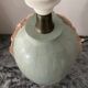 Vintage lamp base in Mactan stone and green marble.