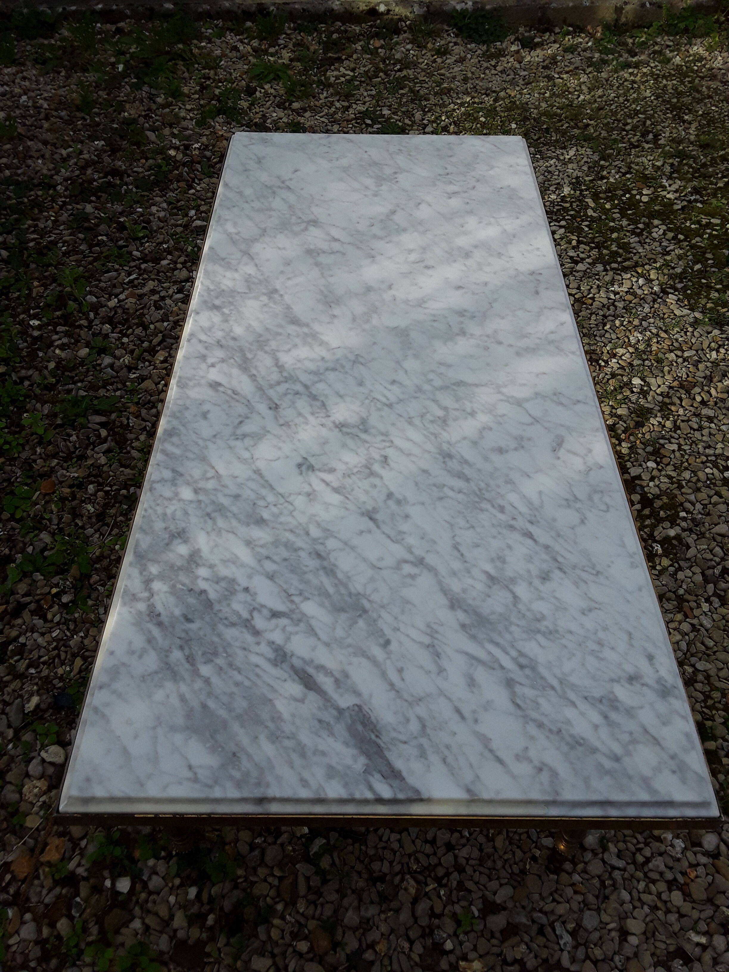 Marble coffee table and gilded brass