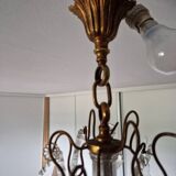 Lustre ancien à 8 bras de lumière à pampilles en bronze et cristal