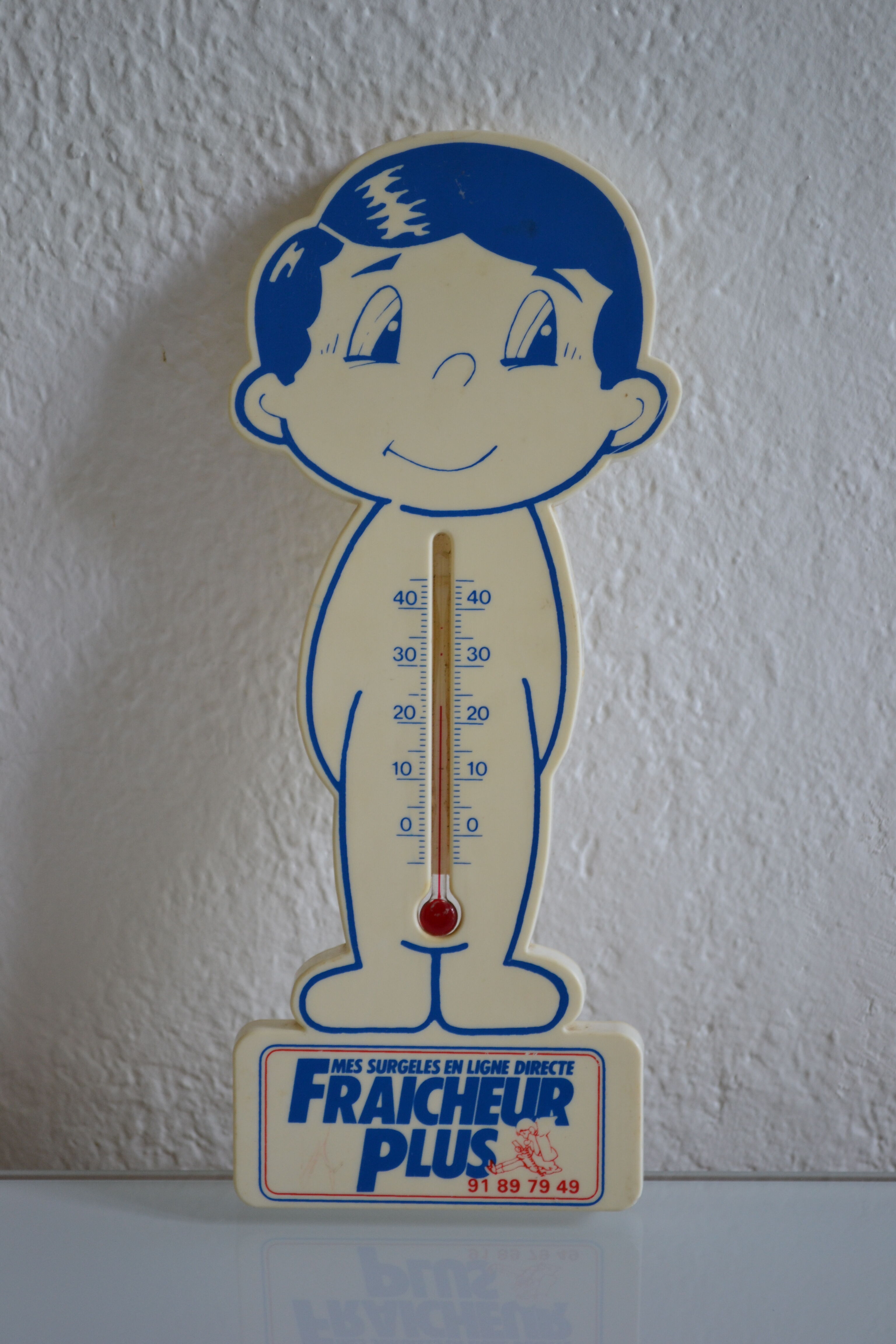 Vintage advertising thermometer