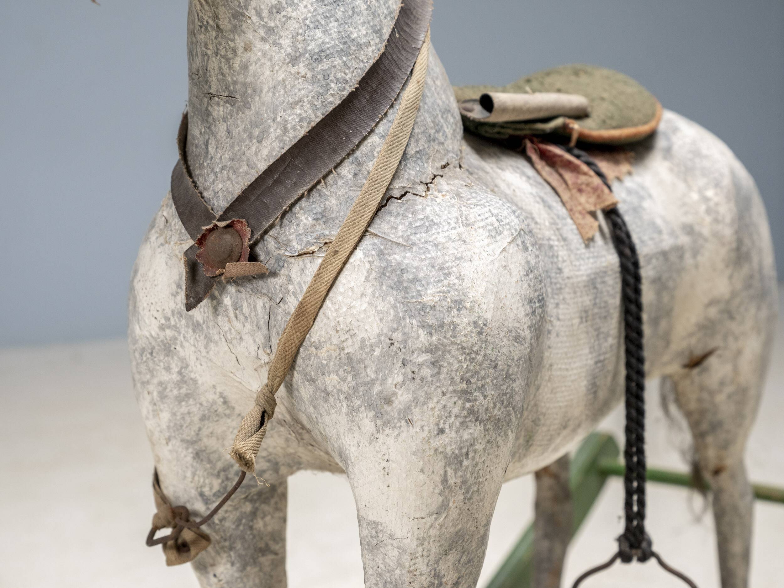 Antique wooden rocking horse, vintage toy with original patina.