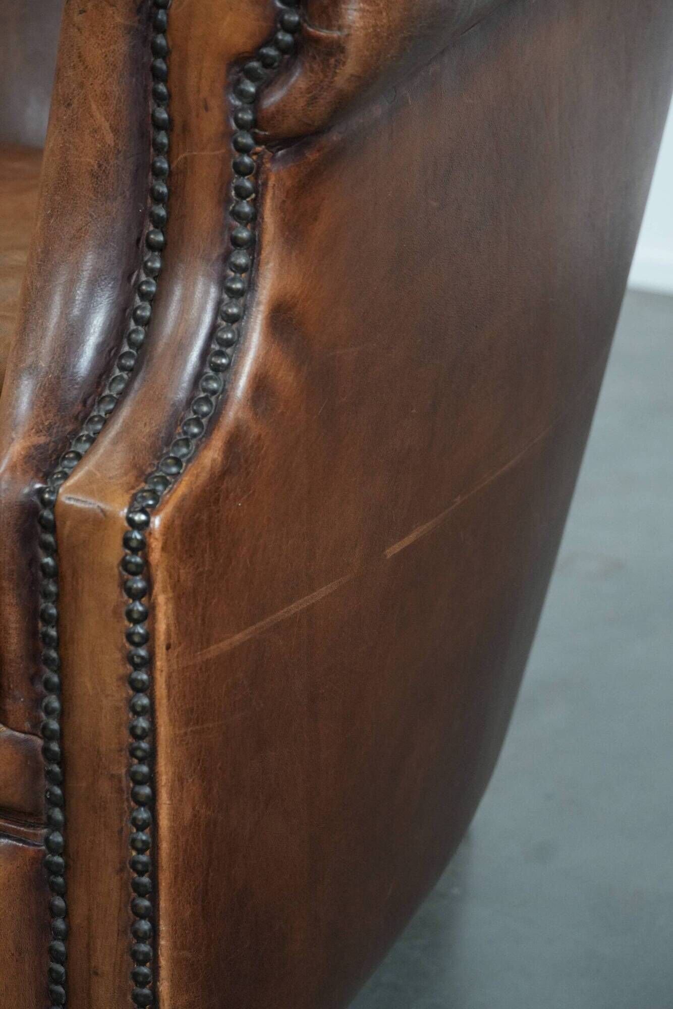 Comfortable club chair made of sheepskin leather