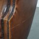 Comfortable club chair made of sheepskin leather