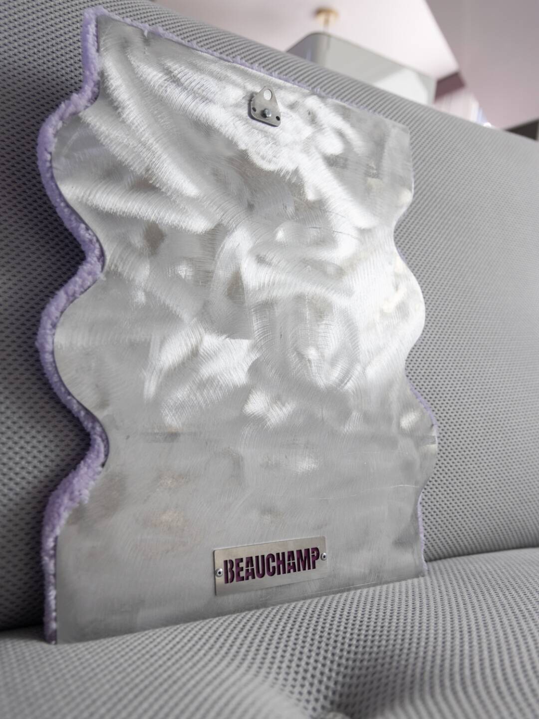 Small lilac wavy mirror