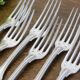 Set of 6 Cailar Bayard dessert forks, Coquille, monogrammed, early 20th century