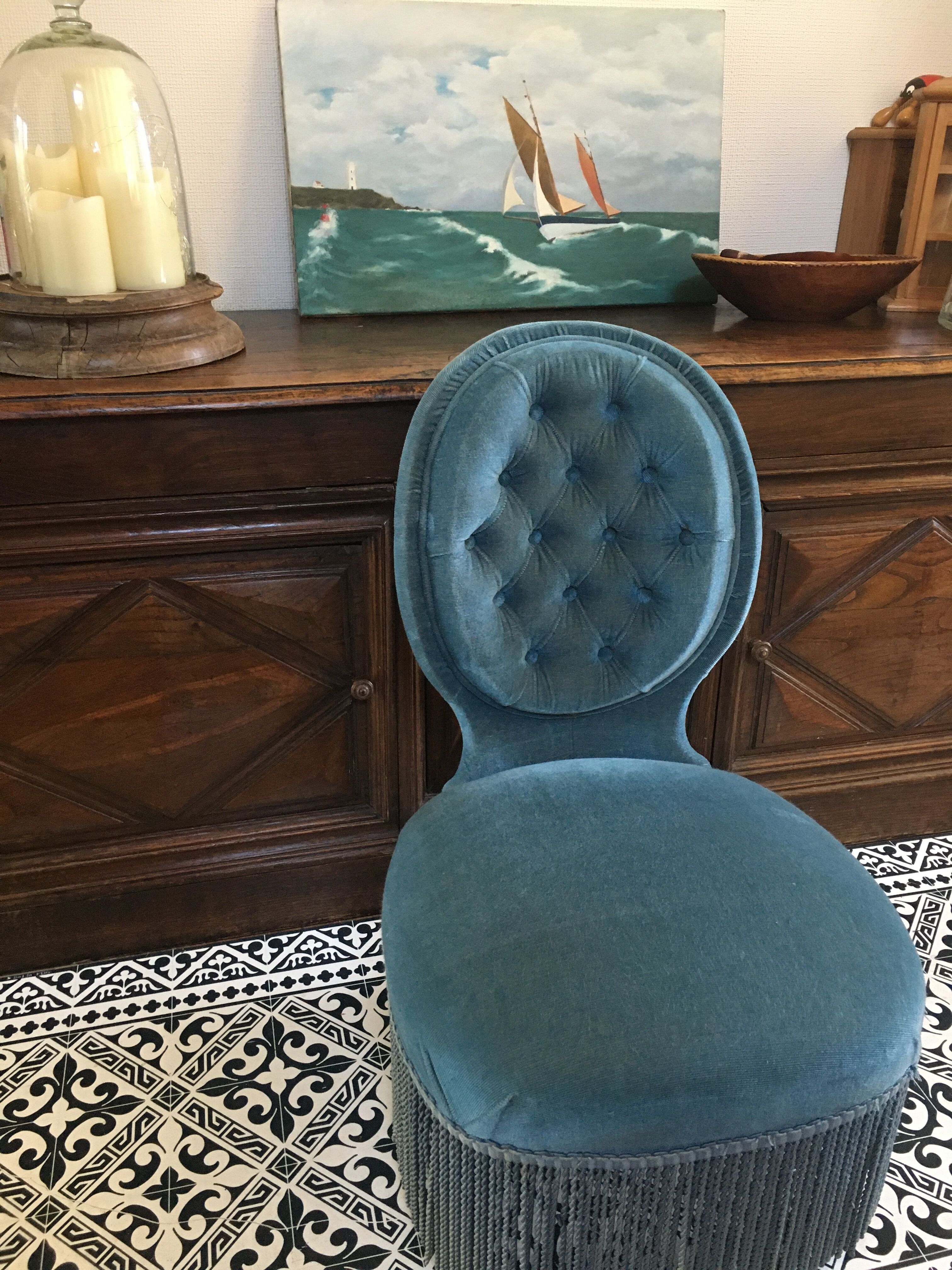 Blue heater with fringed medallion shape