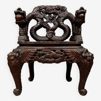 Antique Chinese armchair stamped in richly carved ironwood circa 1880