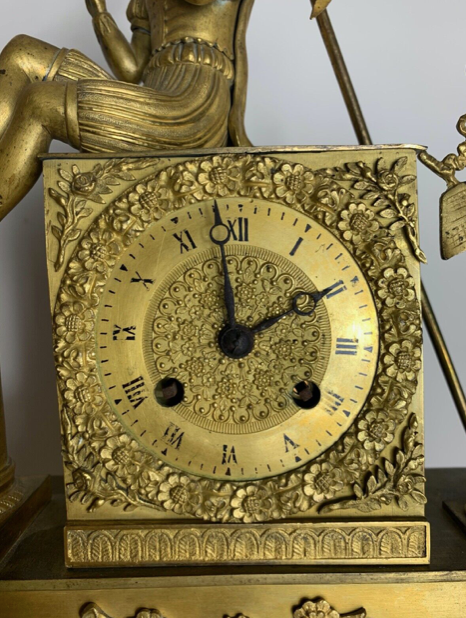 Period clock restoration XIXth in gilded bronze