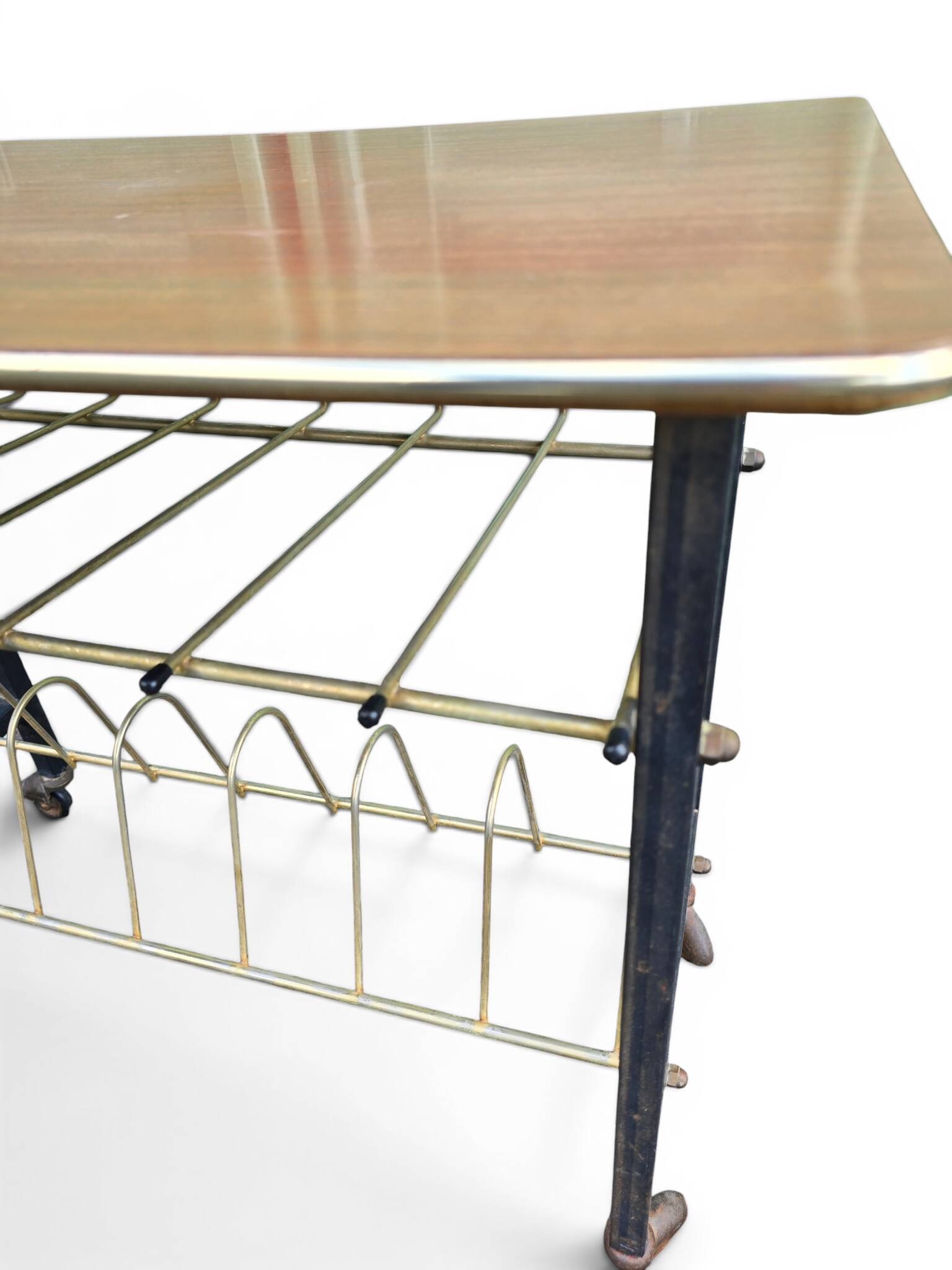 Vintage 1950s magazine table in metal and formica.