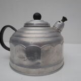 old aluminum kettle with a sufffloating system