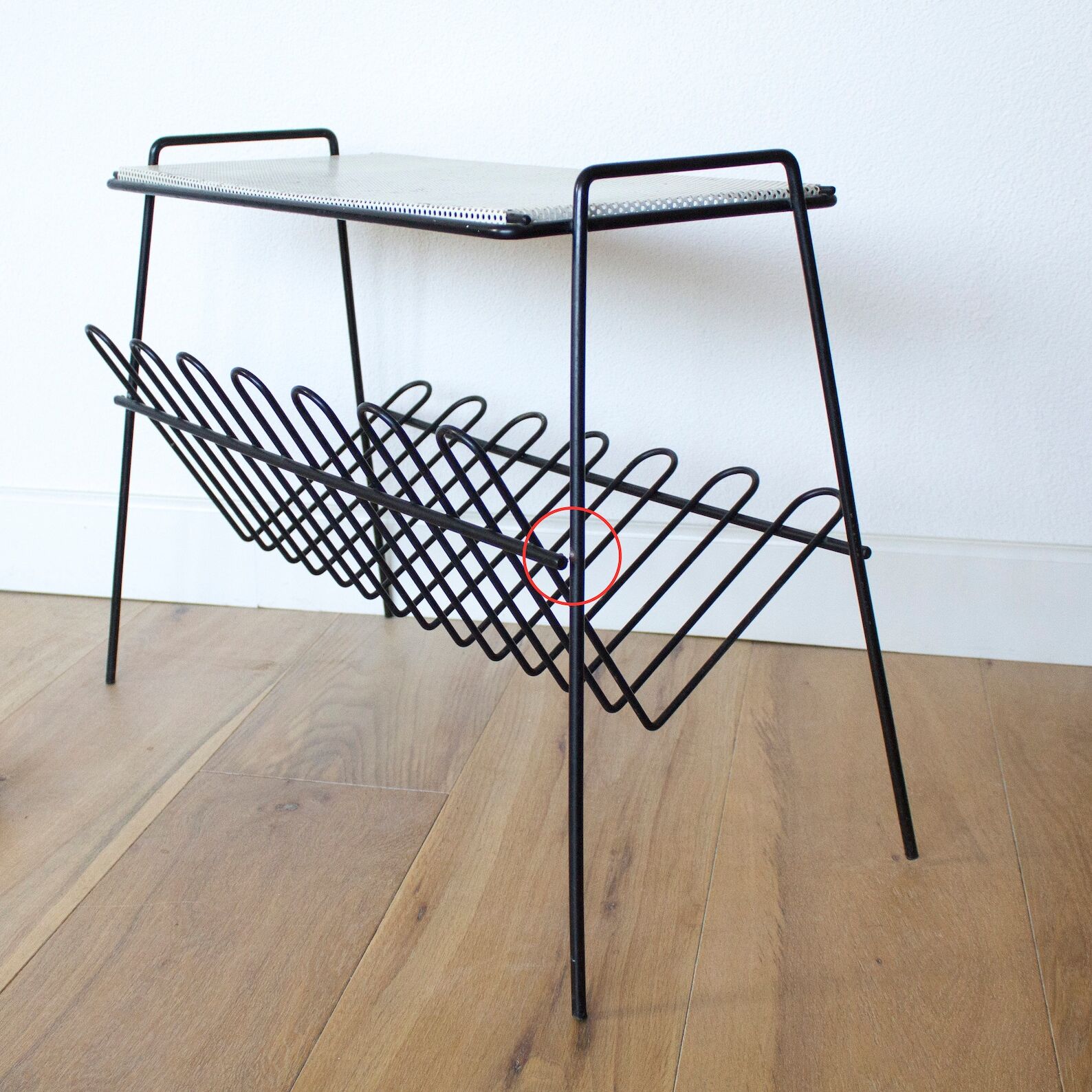 Mid century perorated metal side table with a magazine rack - pilastro tomado artimeta era