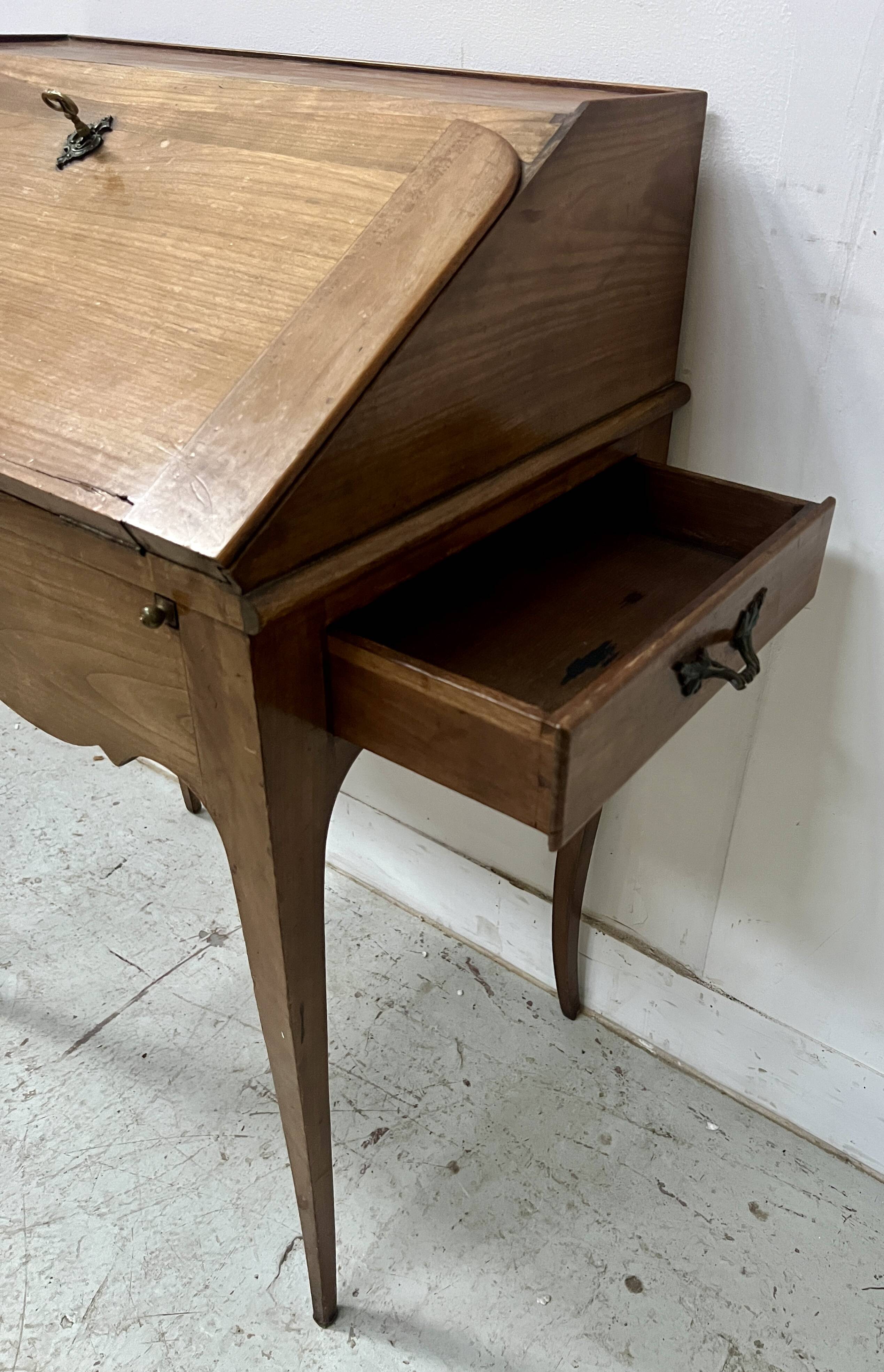 20th century slant-front desk in solid cherry wood