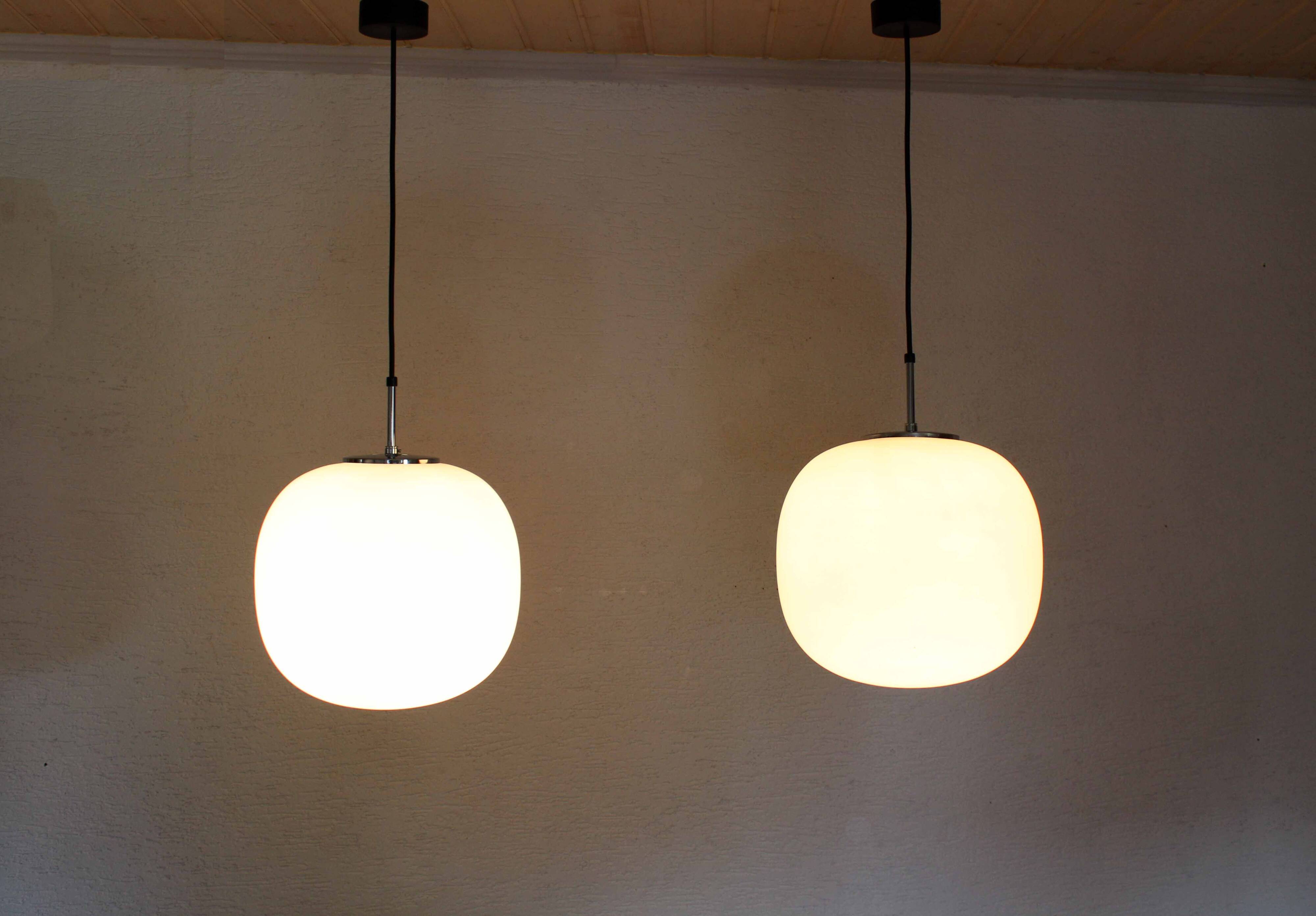 Pair of opal glass pendant lights