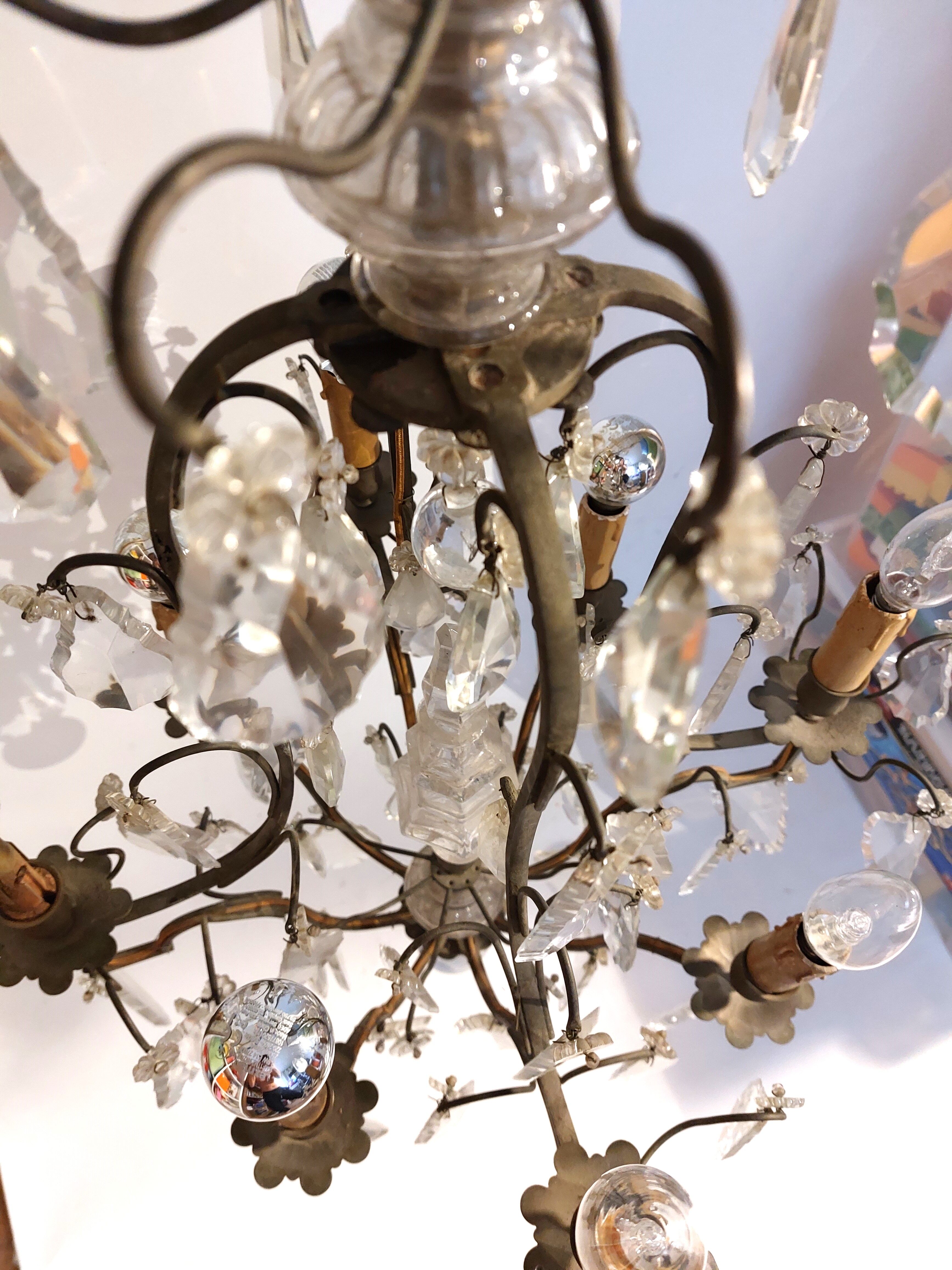 Neoclassical bronze chandelier with 8 lights, tassels and dagger