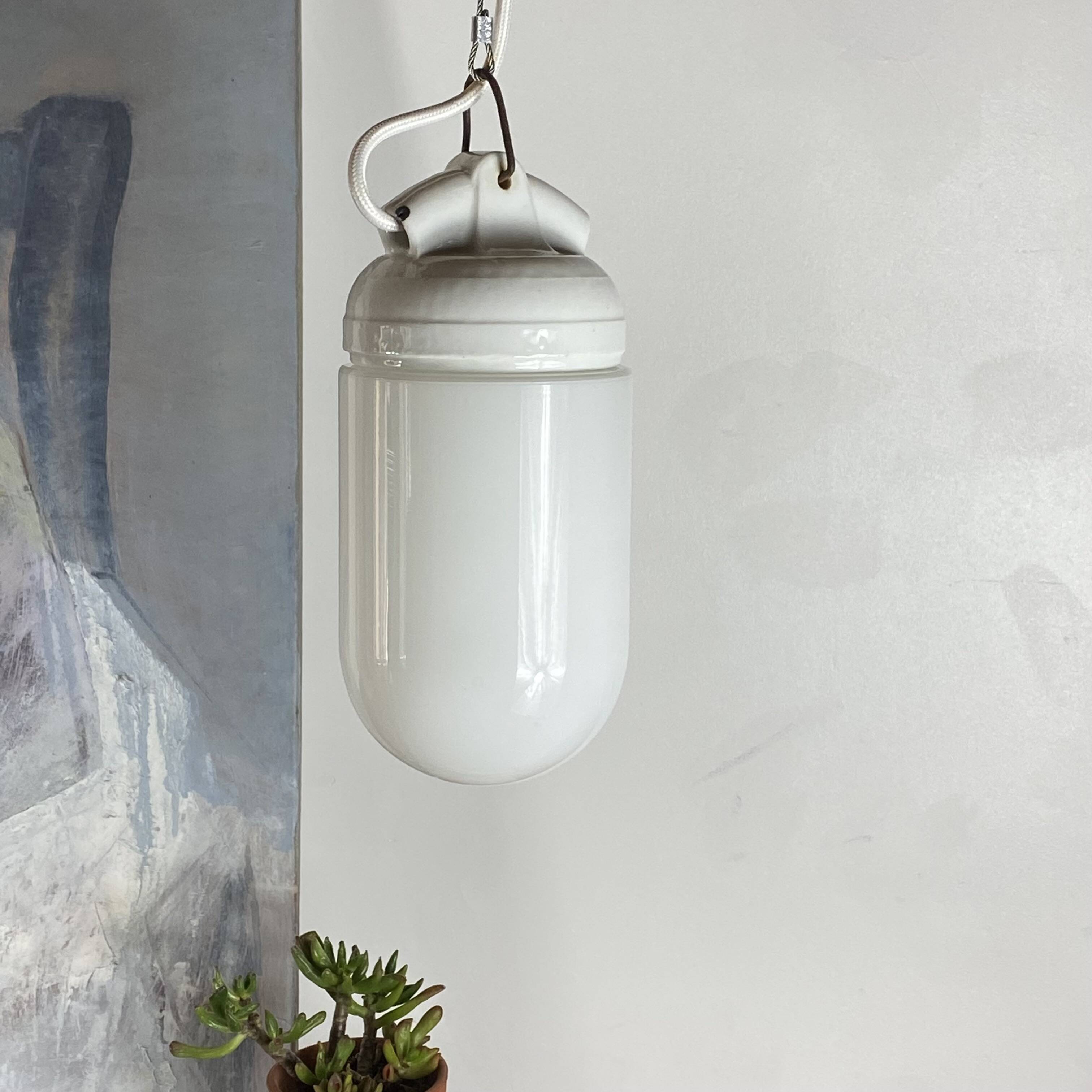 Industrial suspension in white glass and porcelain, vintage model.