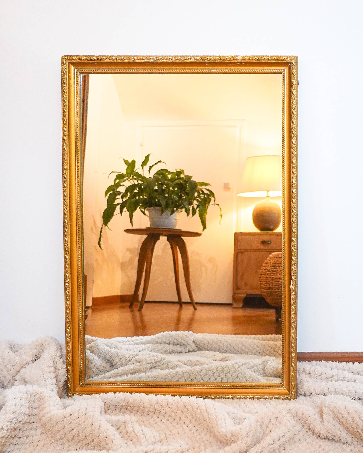 Vintage rectangular gilt mirror, molded wooden frame with beads and fire
