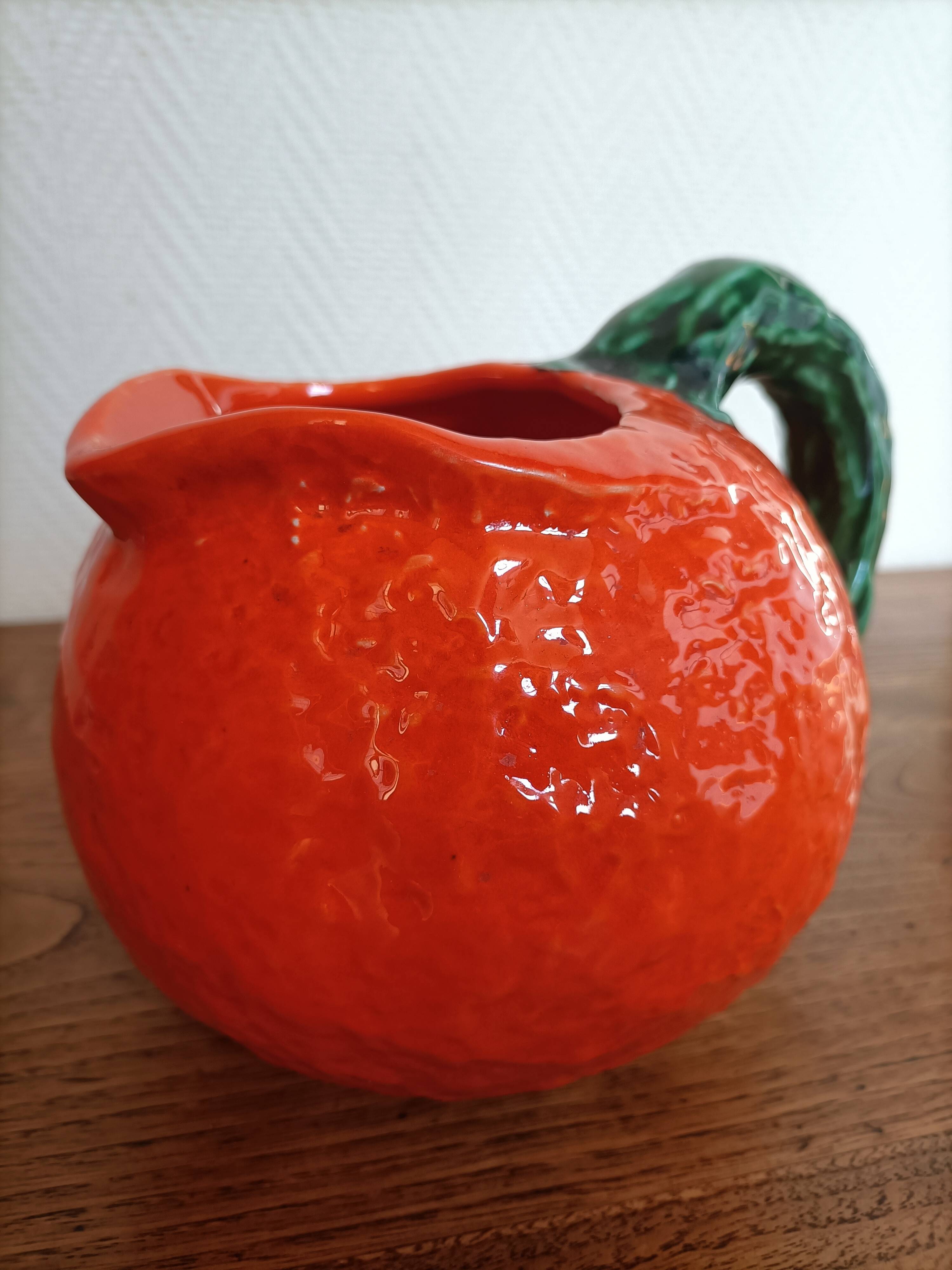 Orange pitcher in Corsican slip