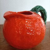 Orange pitcher in Corsican slip