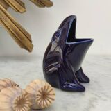 Frog carries bouquet