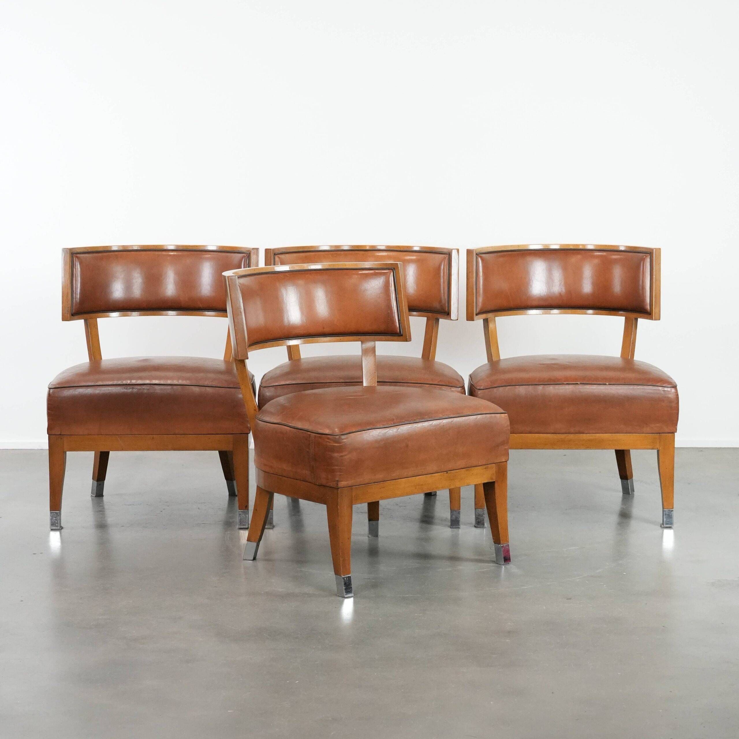 Set of 4 vintage design chairs made of sheepskin leather