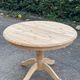 Extendable round dining table with central leg renovated in raw solid wood 105cm