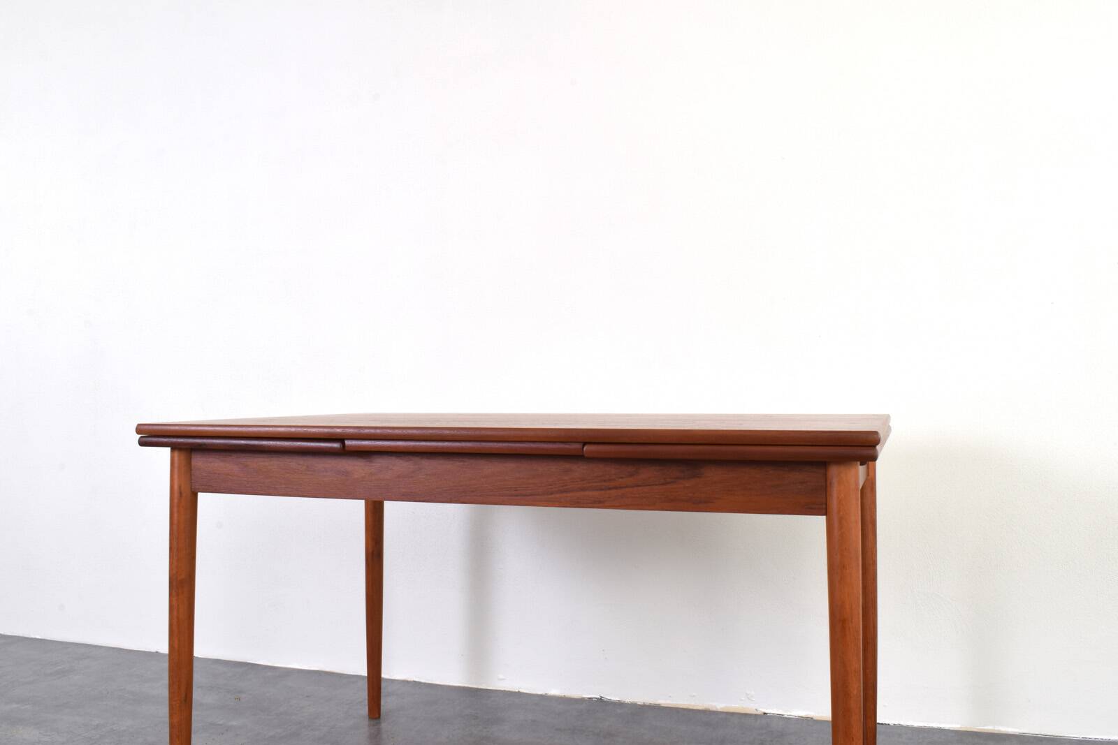 Mid-century Danish teak extendable dining table, 1960s.