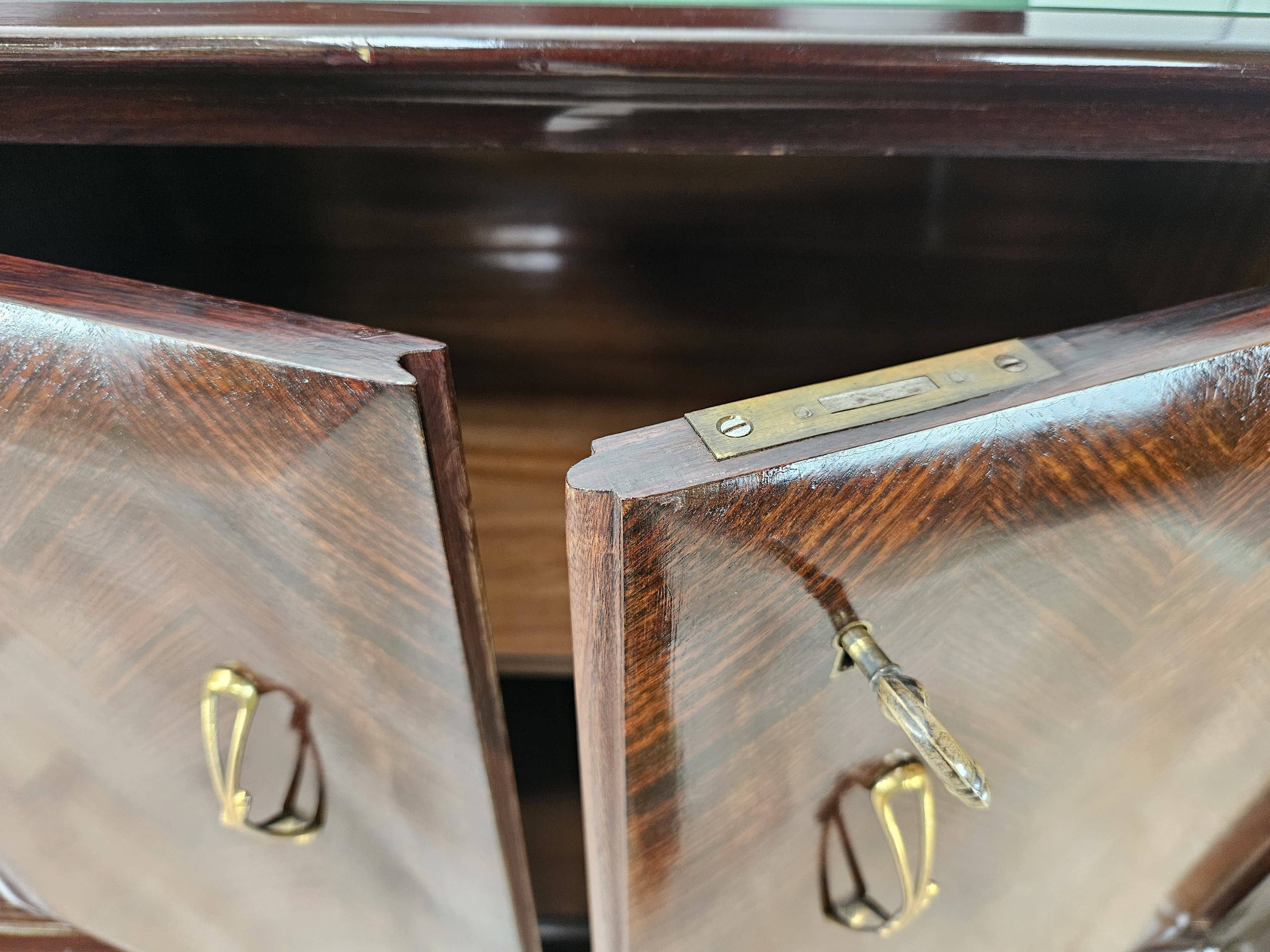 Mahogany sideboard with a glass top, 1960