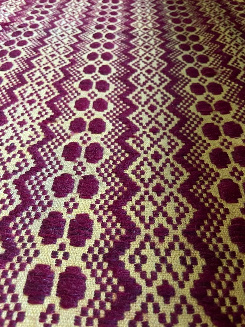Romanian vintage carpet brown design on a yellow background