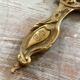 Old bronze hand-facing mirror  13x30cm